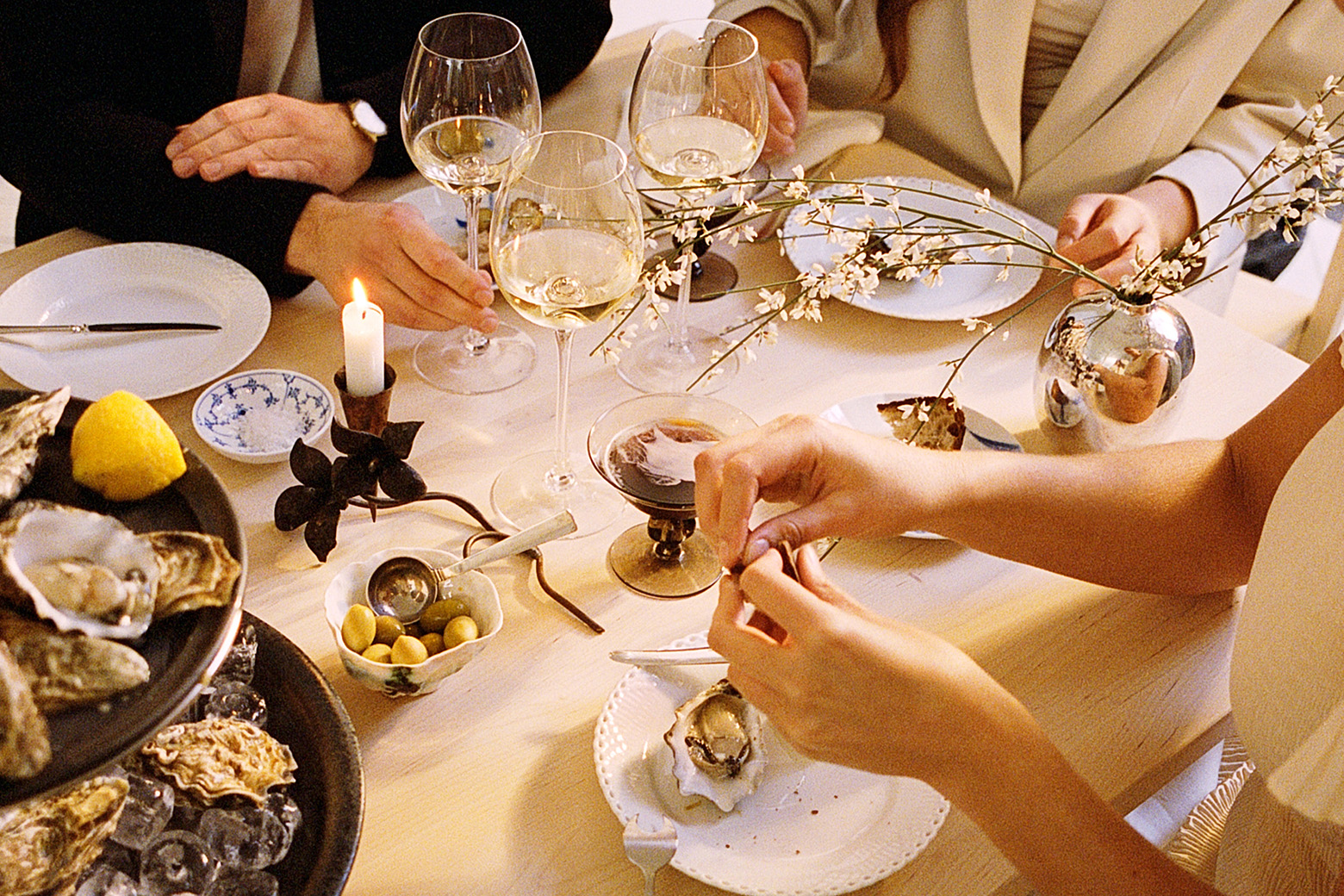 Dinner with friends at a table set with Royal Copenhagen